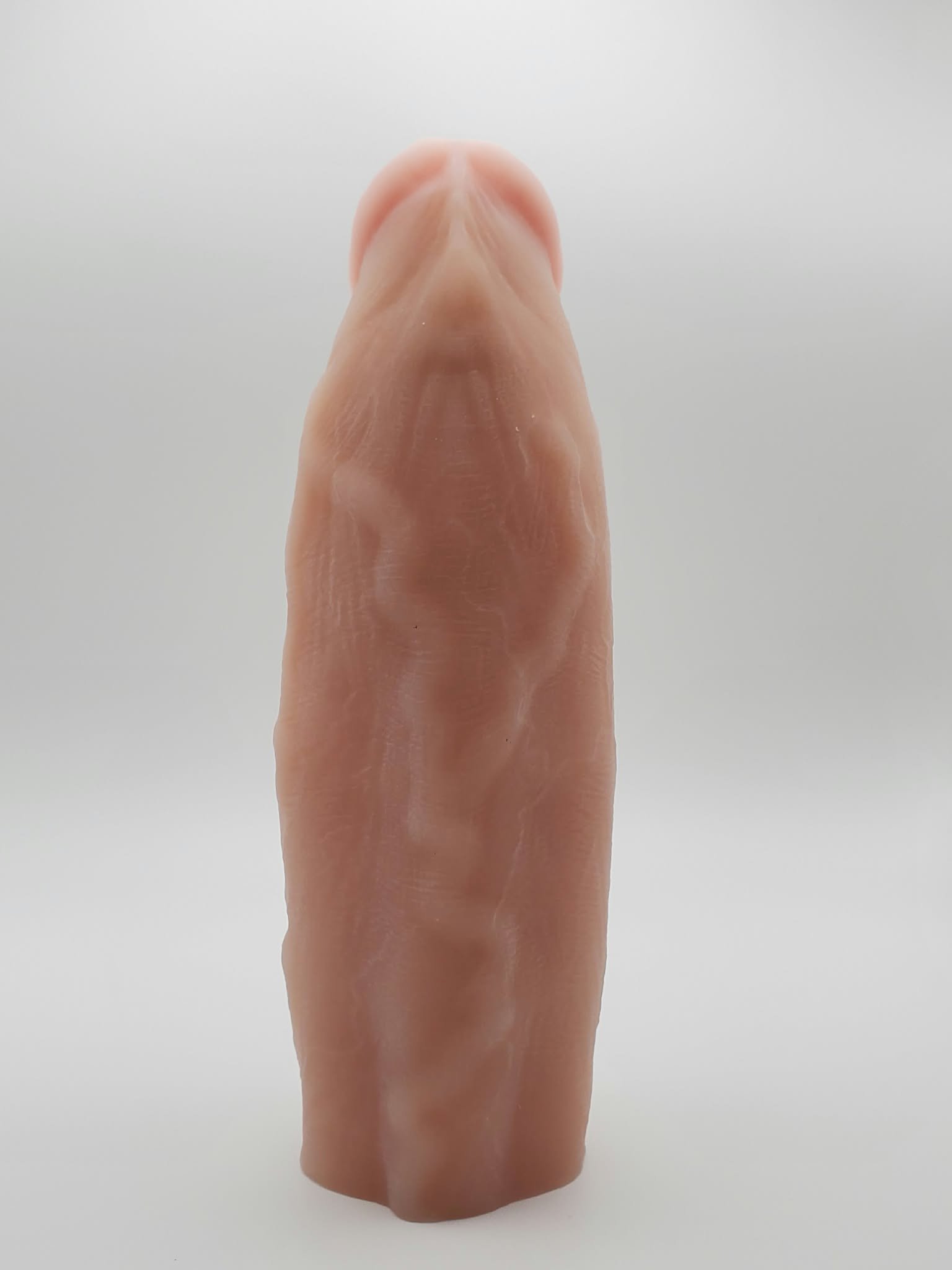 Hyperion platinum silicone sleeve showing detailed hand finishing